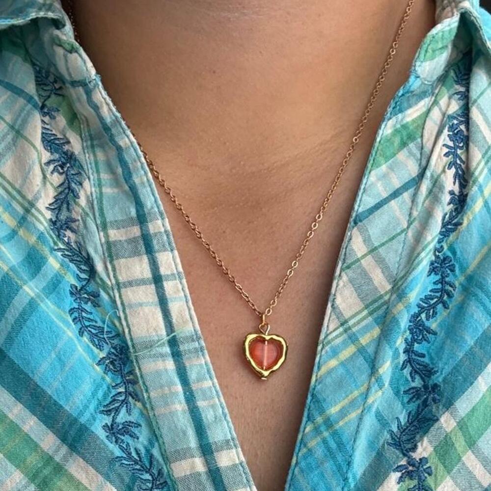 Gold heart necklace with red